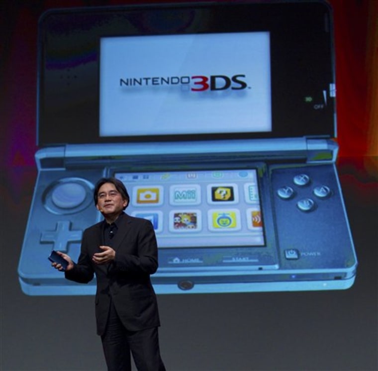Satoru Iwata, president of Nintendo Co. Ltd., showcases the Nintendo 3DS portable video game system at the Game Developers Conference in San Francisco on Wednesday, March 2, 2011. 